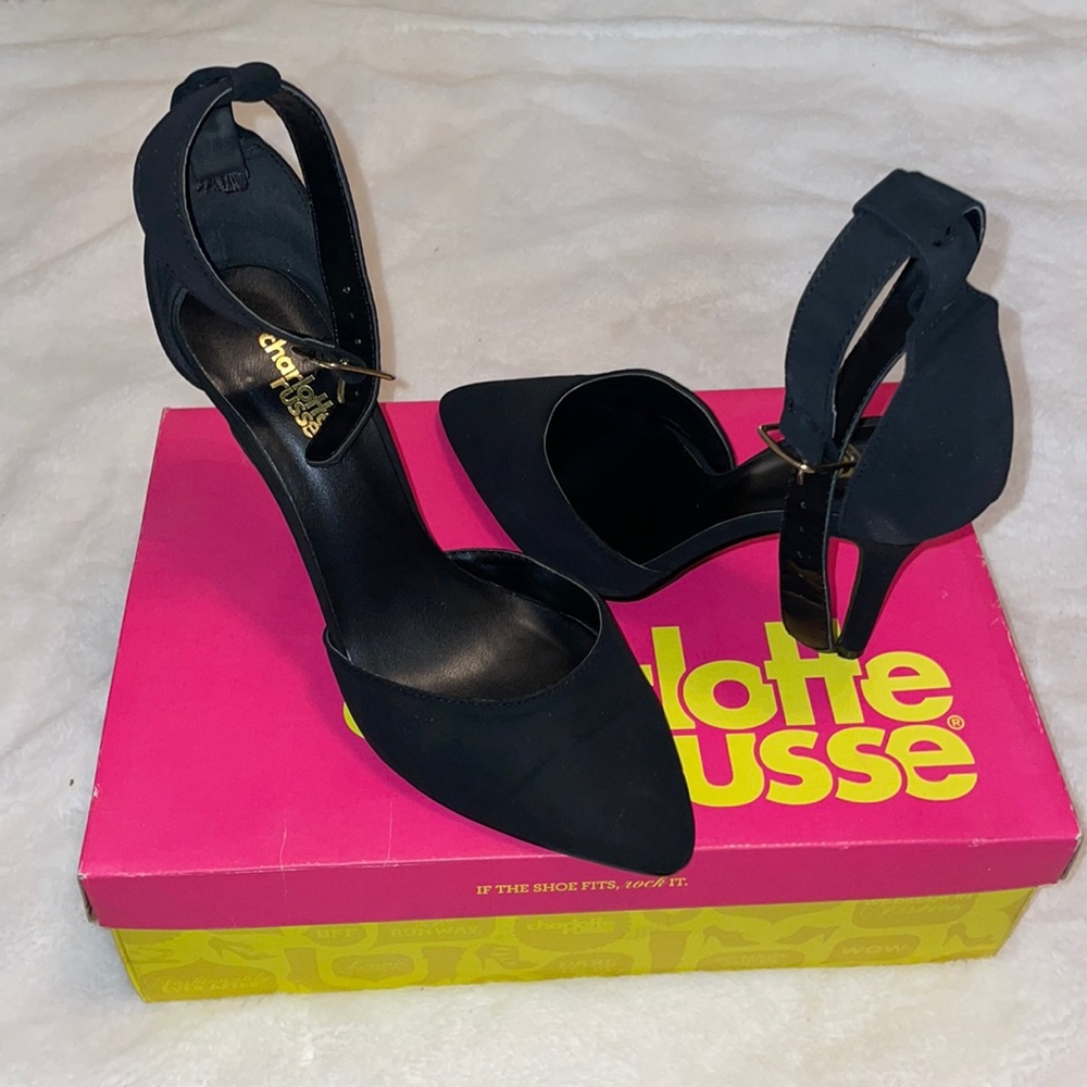 Black suede closed toed ankle strapped heels